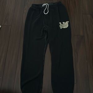 navy fleece free city sweatpants with white bird